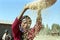 Ethiopian woman separate chaff from the grain