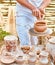 Ethnic art, skilled master creating pot of clay