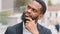 Ethnic bearded African American man entrepreneur pensive manager executive thoughtful worker employer ponder think about