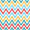 Ethnic colorful ikat abstract geometric chevron pattern in white, blue, red and yellow,