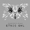 Ethnic patterned white head of owl on the grey background / african / indian / totem / tattoo design. Use for print, posters, t-sh