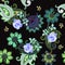 Ethnic seamless pattern with green paisley, fabulous flowers and blue roses on black background