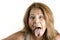 Ethnic woman sticking out her tongue