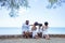 Ethnicity Happy Family Africans Enjoy relaxation resting on the beach summer vacation time