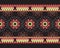 Ethnics pattern with geometric seamless flower in black background for fabric