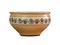 Ethno painted traditional clay bowl beige color with a dark snail-like pattern is isolated on white background