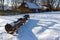 Ethnographic museum in Lublin. Poland, 08 February 2023.snow-covered troughs in front of an old country house