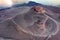 Etna crater mountainscape view from above with tourist in travel