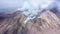 Etna - Panorama of the crater of the volcano of Sicily with smoke and magma