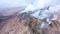 Etna - Panorama of the crater of the volcano of Sicily with smoke and magma