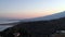 Etna volcano an its sea at sunset