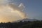 Etna volcano with steam clouds, sunset panorama