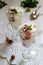 Eton mess, traditional English dessert with gooseberry, whipped cream and meringue on a light background. Rustic style.