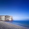 Etretat Aval cliff landmark and its beach. Night photography. Normandy, France.