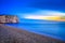 Etretat Aval cliff landmark and its beach. Twilight photography. Normandy, France.