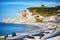 ETRETAT, FRANCE - JULY 22, 2019: Panoramic landscape of white chalk cliffs and natural arches of Etretat, Seine-Maritime