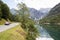 Ettal, Germany, 23 July 2015: Red car speeding on alpine road, A