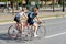 Etterbeek, Brussels Capital Region - Belgium - Two teenage girls on a racing bike