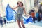 EU Flag. Cute happy girl with the flag of the European Union. Young teenage girl waving with the European Union flag in the city