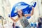 EU Flag. Cute happy girl with the flag of the European Union. Young teenage girl waving with the European Union flag in the city