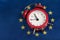 EU flag and vintage alarm clock. Close up. Time to join the EU concept