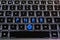 EU Flag and words \\\'PNRR\\\' on the buttons of backlight keyboard of laptop.