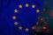 EU national flag on silk  background coronavirus  tourism concept  state border quarantine measures  vaccination against