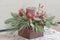 Eucalyptus Christmas floral decoration in wooden container