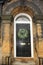 Eucalyptus wreath on a black door