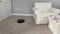 A Eufy robotic vacuum cleaning a carpeted floor