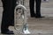 A euphonium instrument for playing a marching band on the floor.
