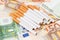 Euro banknotes with cigarettes