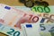 Euro banknotes in denominations of five, ten, twenty, fifty, one hundred and euro coins. European currency. Cash money for payment