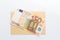 Euro banknotes on envelope