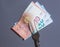 Euro banknotes on fork. Expensive life, high costs for nutrition.