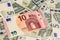 Euro banknotes, texture from 5 and 10 euros, ten euros outweigh five euros