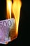 Euro bill on fire