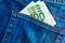 Euro bills in jeans pocket background. Euro banknotes in jeans back pocket. Concept of rich people, saving or spending money. Euro