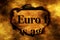 Euro and burning paper hole