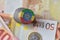 Euro coin with national flag of ethiopia on the euro money banknotes background.