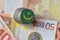 Euro coin with national flag of mauritania on the euro money banknotes background.