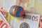 Euro coin with national flag of mongolia on the euro money banknotes background.