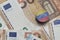 euro coin with national flag of venezuela on the euro money banknotes background