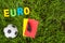 Euro football championship - image with ball, referee yellow, red card on green lawn. Symbol of soccer and fair play