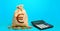 Euro money bag and calculator. Accounting concept. Analysis of loan selection. Budgeting. Income and expenses