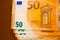 Euro money. Money background. euros banknotes pack set on a brown background.Spending and income in European countries