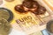 Euro money, paper banknotes and coins close-up macro