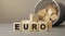 Euro - word concept from wooden blocks on desk