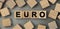 euro - word concept from wooden blocks. Top view