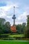 Euromast observation tower in Rotterdam, Netherlands. City park trees and green grass